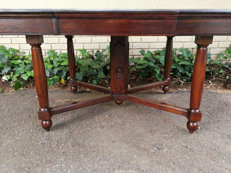 An Edwardian Style Oak 8 Seater Table on an X Stretcher Base