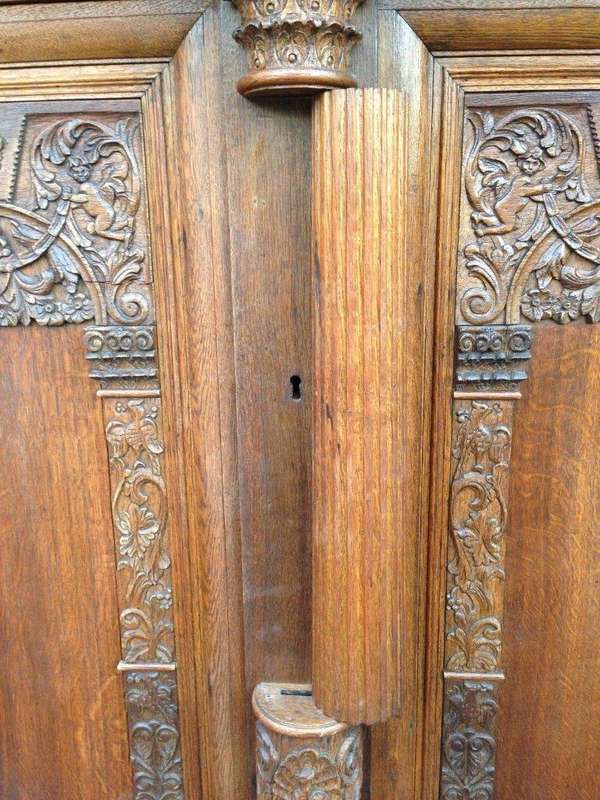 An Early 19th Century Renaissance Ornately Carved Oak Kussenkast On Bun Feet (Useful for TV or st...