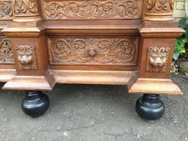 An Early 19th Century Renaissance Ornately Carved Oak Kussenkast On Bun Feet (Useful for TV or st...