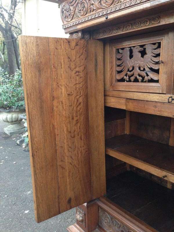 An Early 19th Century Renaissance Ornately Carved Oak Kussenkast On Bun Feet (Useful for TV or st...