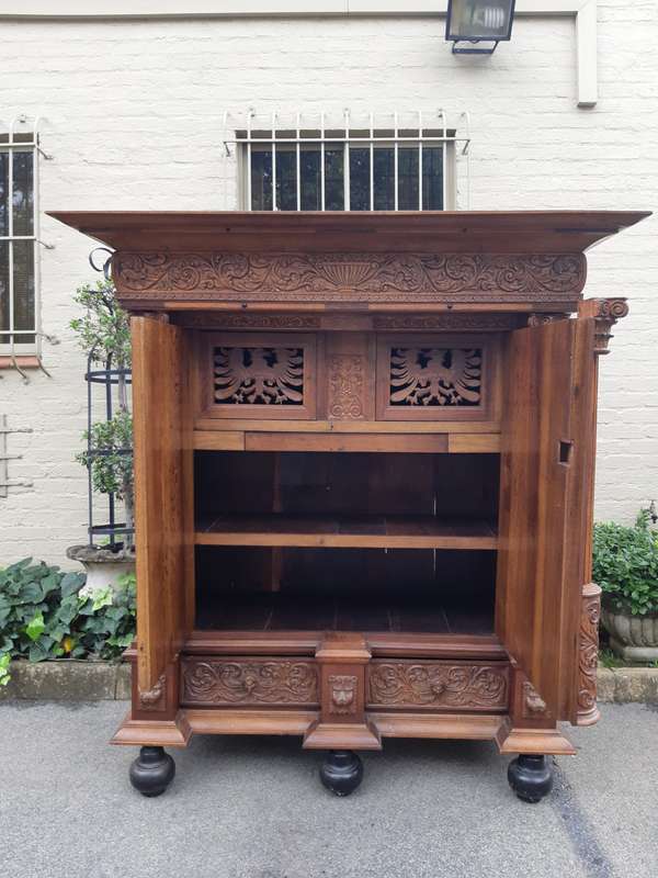 An Early 19th Century Renaissance Ornately Carved Oak Kussenkast On Bun Feet (Useful for TV or st...