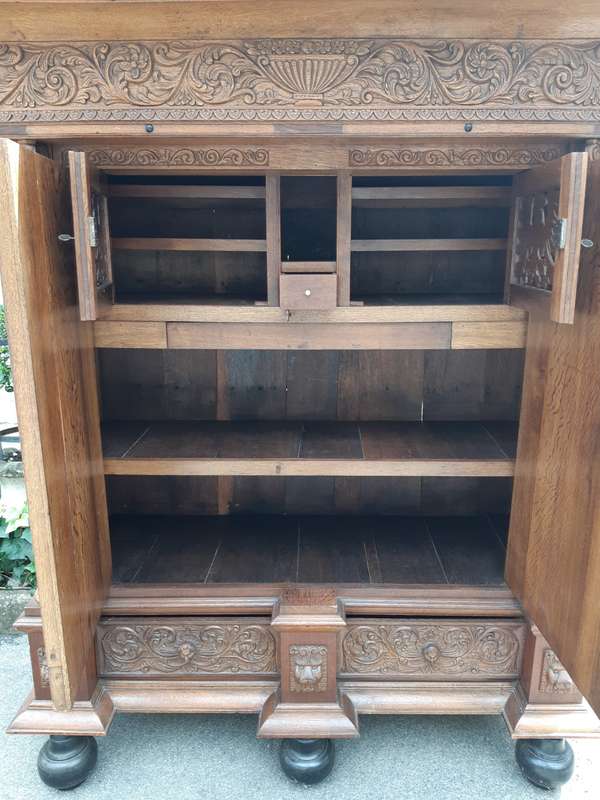 An Early 19th Century Renaissance Ornately Carved Oak Kussenkast On Bun Feet (Useful for TV or st...