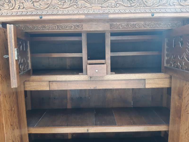 An Early 19th Century Renaissance Ornately Carved Oak Kussenkast On Bun Feet (Useful for TV or st...
