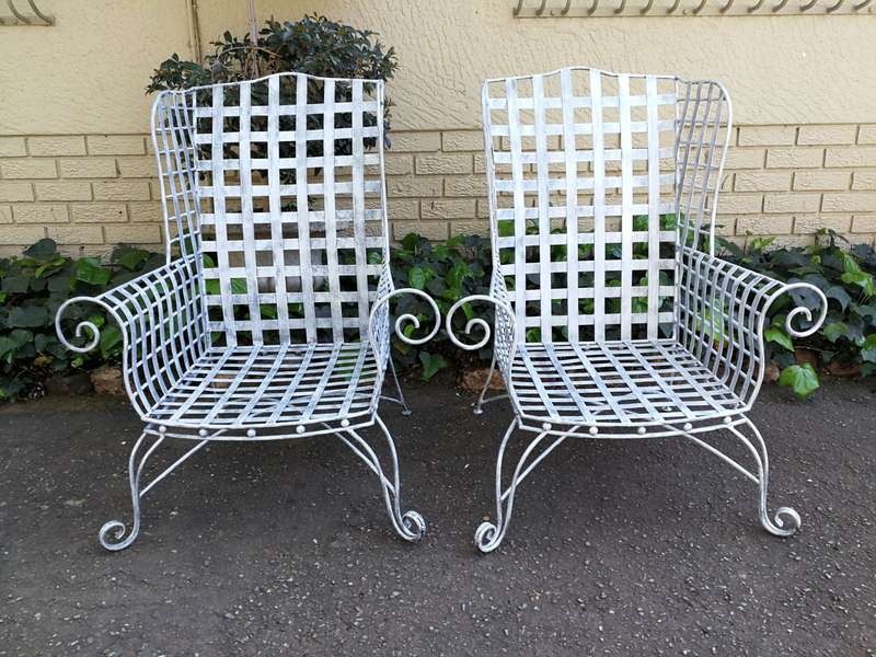 A Pair Of Custom-Made Heavy Wrought Iron Armchairs In a Painted Silver Antique Finish