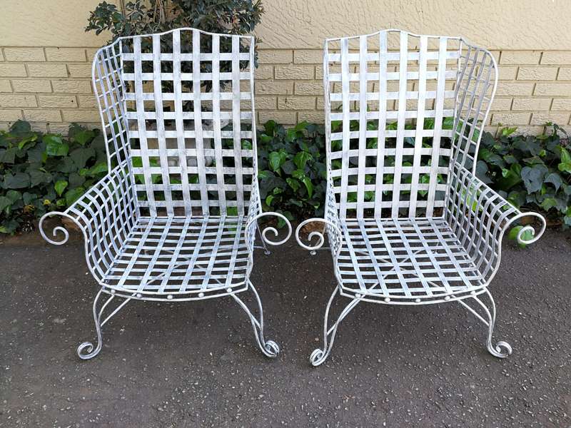 A Pair Of Custom-Made Heavy Wrought Iron Armchairs In a Painted Silver Antique Finish