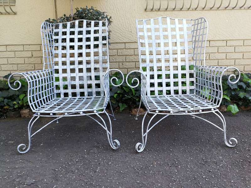 A Pair Of Custom-Made Heavy Wrought Iron Armchairs In a Painted Silver Antique Finish