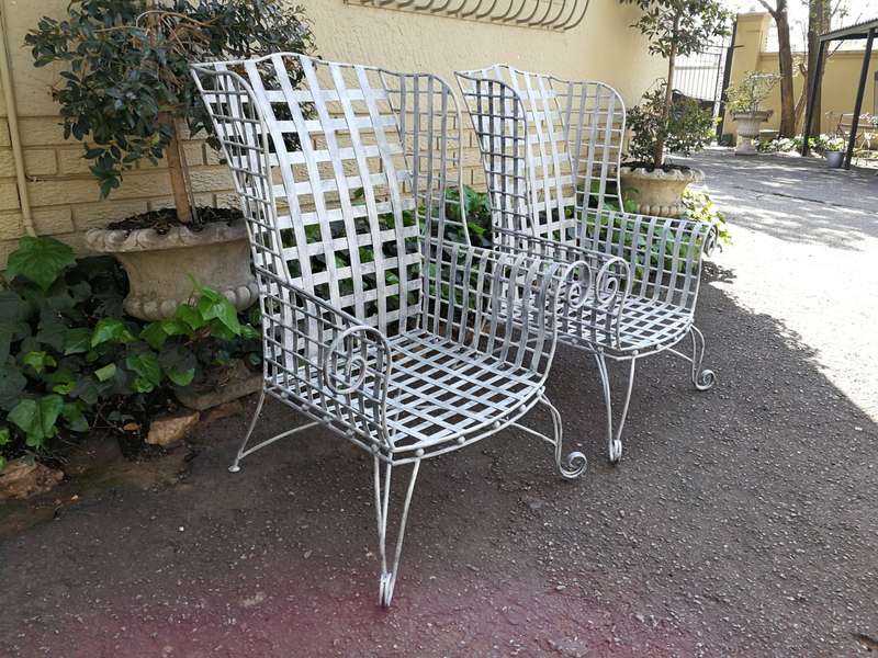 A Pair Of Custom-Made Heavy Wrought Iron Armchairs In a Painted Silver Antique Finish