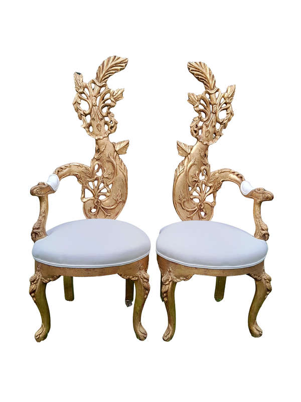 A Pair of Baroque Style Carved and Hand Gilded High Back Throne Chairs (upholstered in white)