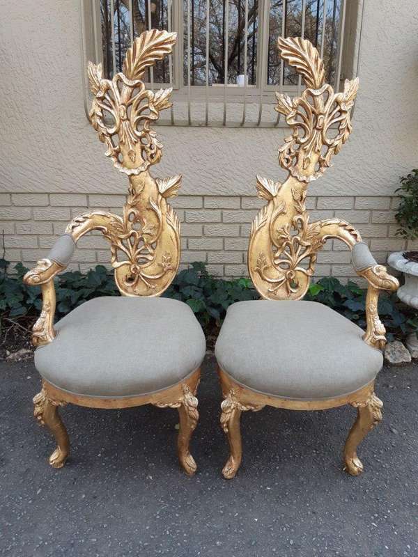 A Pair of Baroque Style Carved and Hand Gilded High Back Throne Chairs (upholstered in linen upho...