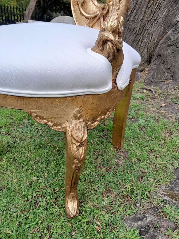 A Pair of Baroque Style Carved and Hand Gilded High Back Throne Chairs (upholstered in white)