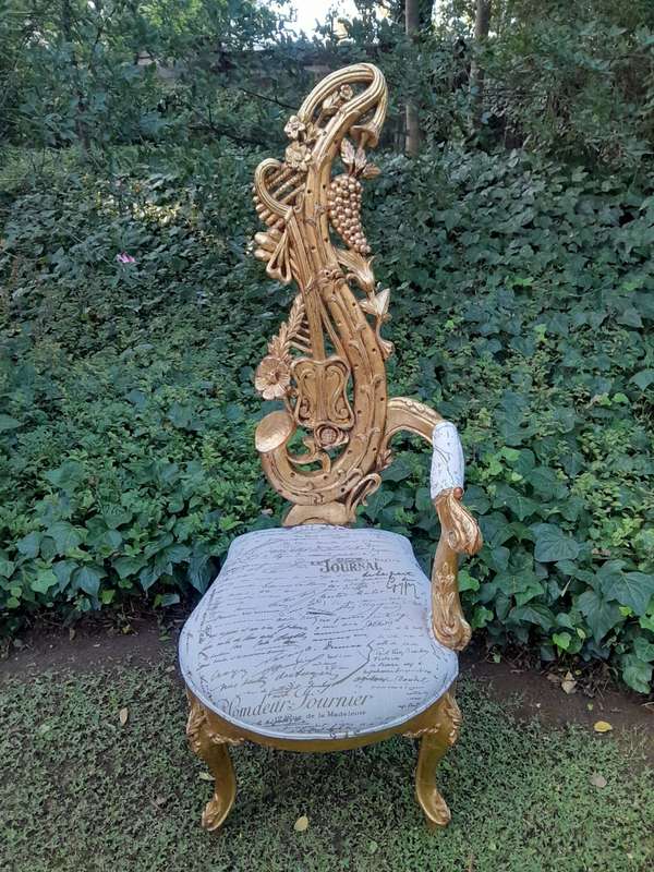 A Pair of Baroque Style Carved and Hand Gilded High Back Throne Chairs (upholstered linen upholst...