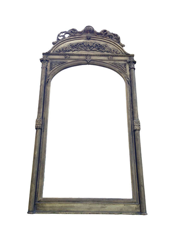 An Ornate Carved & Bevelled Mirror