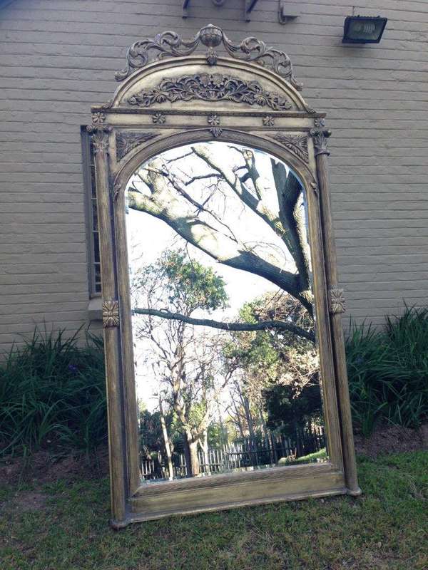 An Ornate Carved & Bevelled Mirror