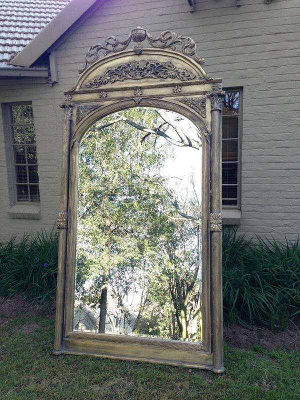 An Ornate Carved & Bevelled Mirror