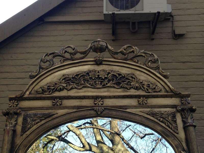 An Ornate Carved & Bevelled Mirror