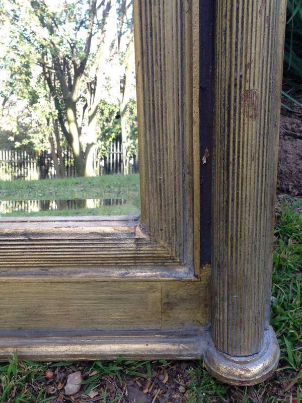 An Ornate Carved & Bevelled Mirror