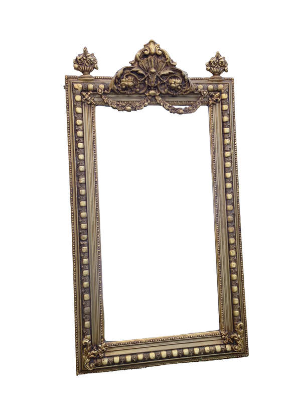 An Ornate Carved Painted Mirror