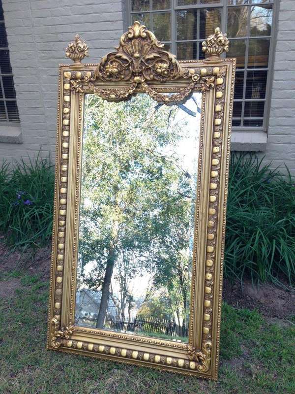 An Ornate Carved Painted Mirror