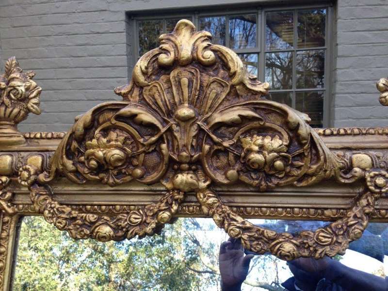 An Ornate Carved Painted Mirror