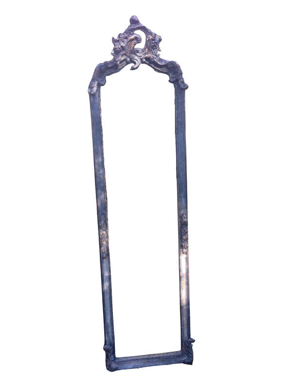 An Ornate Carved Gilded Mirror in the Rococo Style