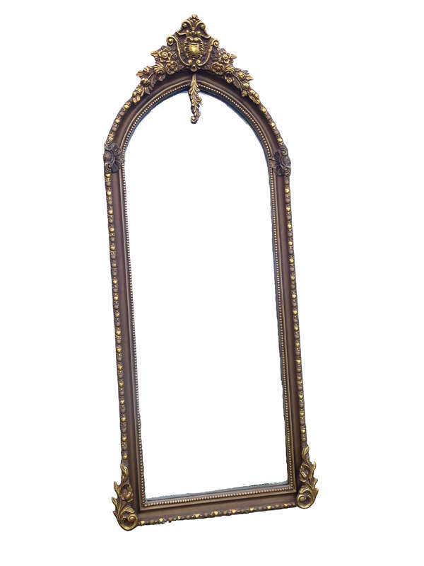An Ornate Carved Arched Bevelled Mirror