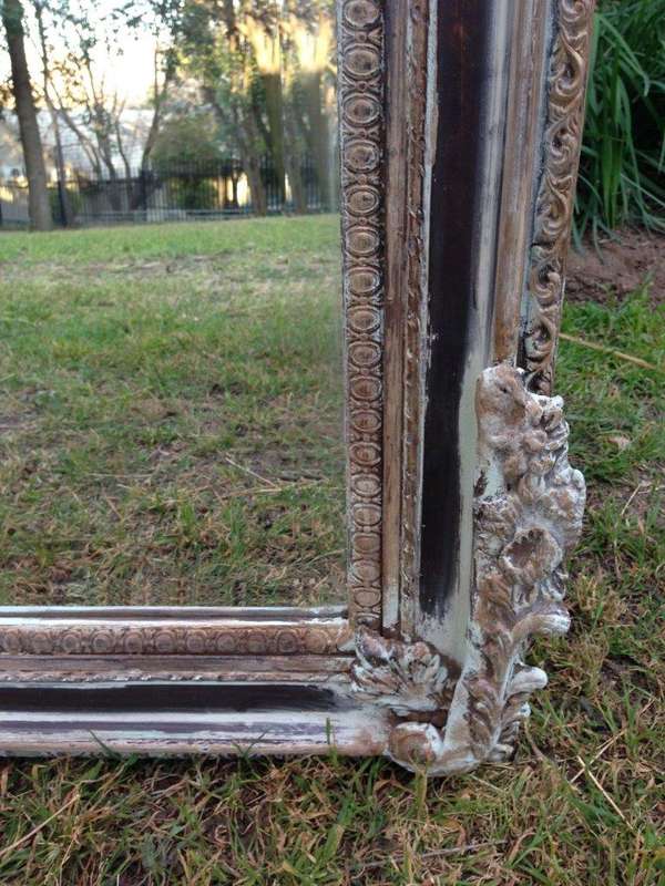 An Ornate Carved & Bevelled Painted Mirror