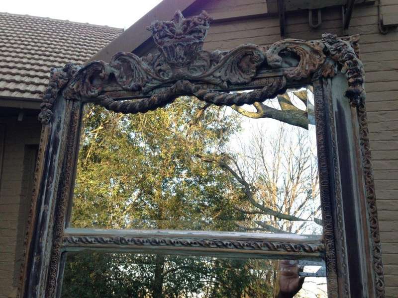 An Ornate Carved & Bevelled Painted Mirror