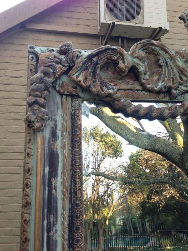 An Ornate Carved & Bevelled Painted Mirror