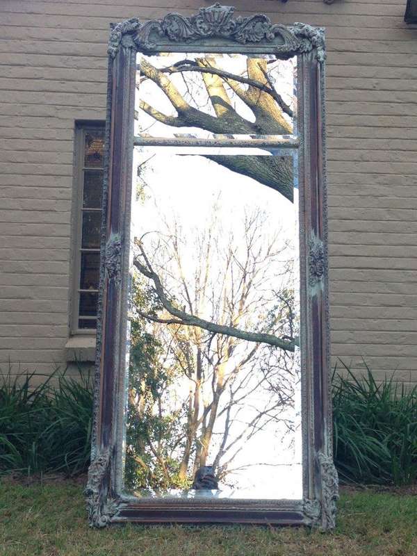 An Ornate Carved & Bevelled Painted Mirror