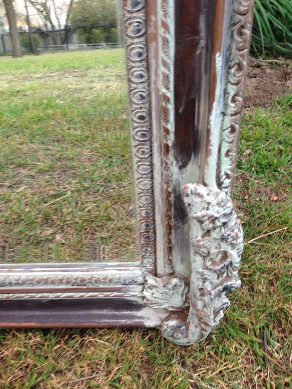 An Ornate Carved & Bevelled Painted Mirror