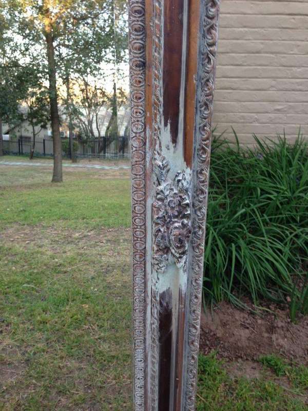 An Ornate Carved & Bevelled Painted Mirror