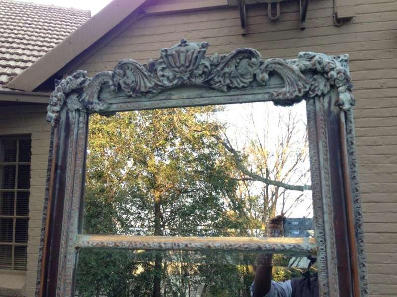 An Ornate Carved & Bevelled Painted Mirror