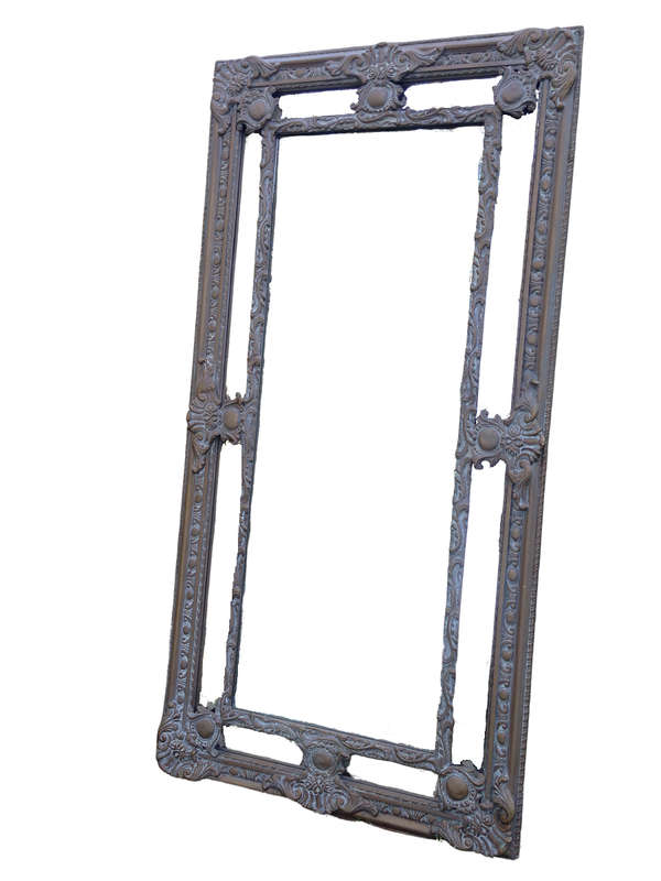 An Ornate Carved & Painted Mirror