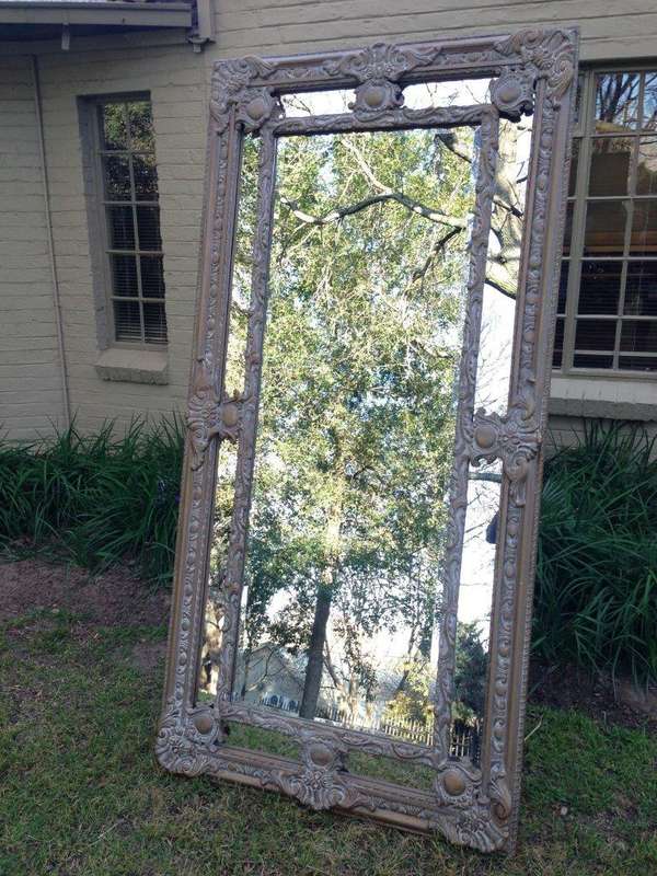 An Ornate Carved & Painted Mirror
