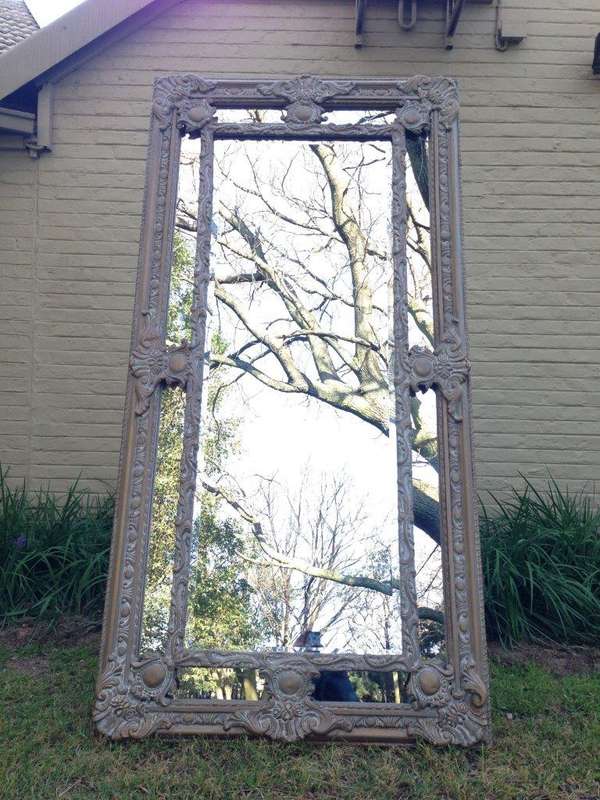 An Ornate Carved & Painted Mirror