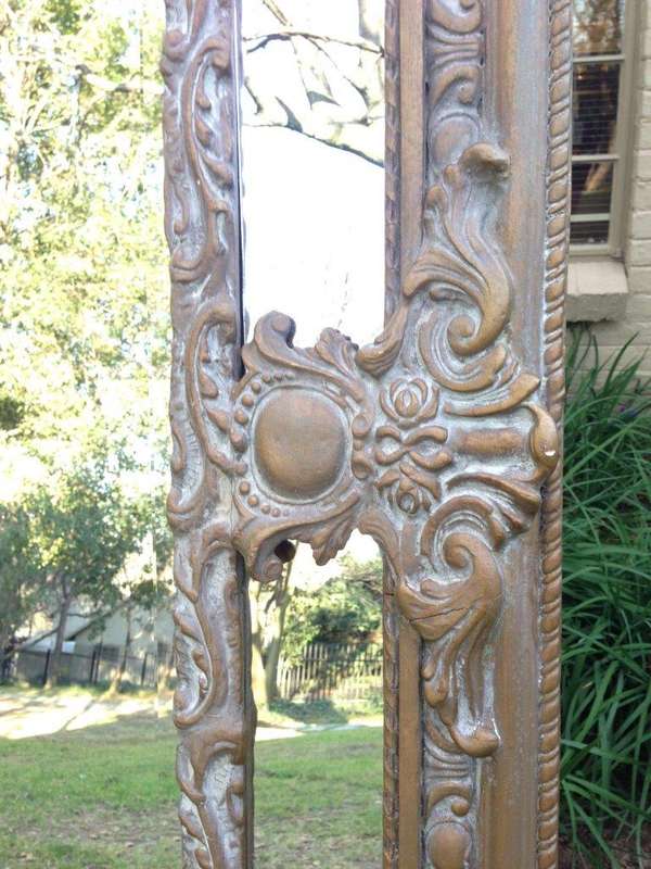An Ornate Carved & Painted Mirror