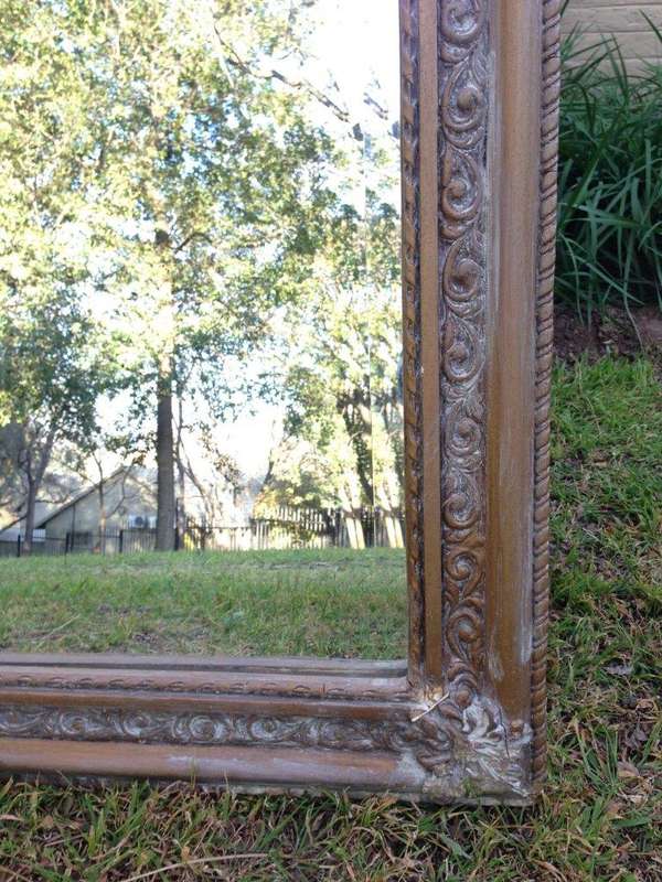 An Ornate Carved & Bevelled Painted Mirror