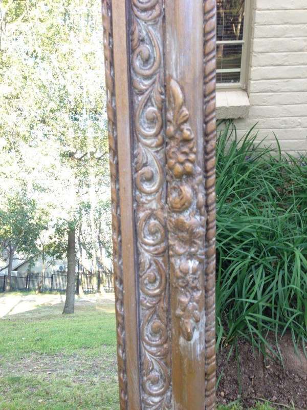 An Ornate Carved & Bevelled Painted Mirror