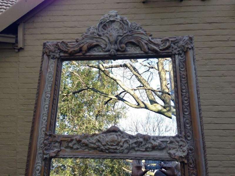 An Ornate Carved & Bevelled Painted Mirror