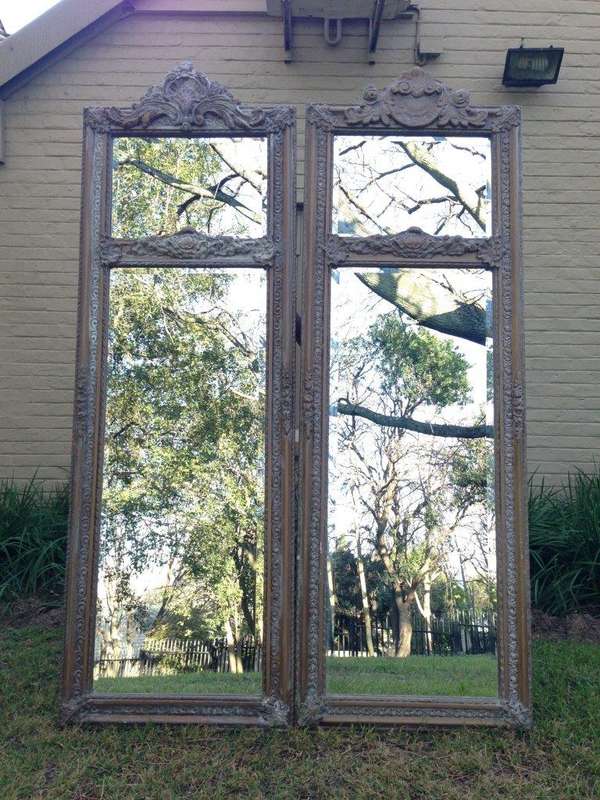 An Ornate Carved & Bevelled Painted Mirror
