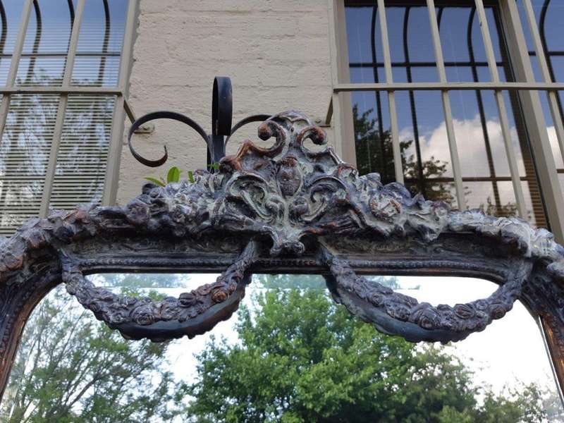 An Ornate Carved & Bevelled Painted Mirror