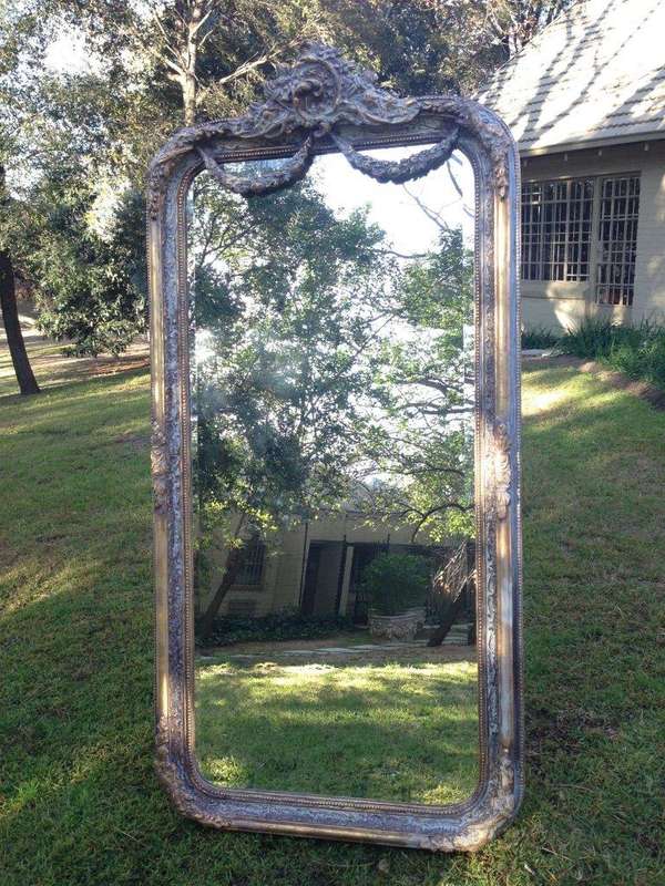 An Ornate Carved & Bevelled Painted Mirror