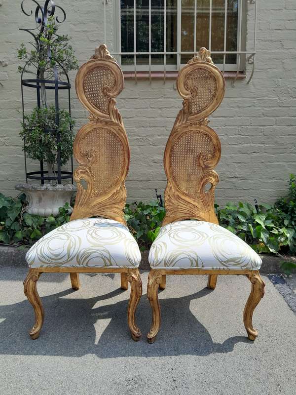 A 20th Century Rare Pair of Baroque Style Carved and Hand Gilded Throne Chairs Upholstered in a C...