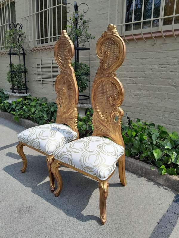 A 20th Century Rare Pair of Baroque Style Carved and Hand Gilded Throne Chairs Upholstered in a C...