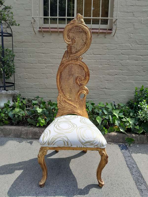 A 20th Century Rare Pair of Baroque Style Carved and Hand Gilded Throne Chairs Upholstered in a C...