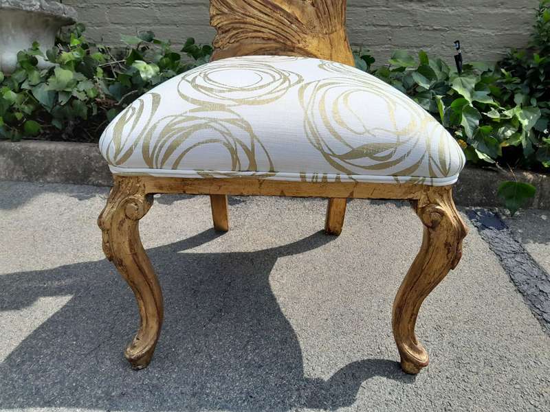 A 20th Century Rare Pair of Baroque Style Carved and Hand Gilded Throne Chairs Upholstered in a C...