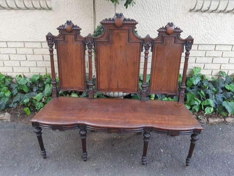 French 19th Century oak carved 3-seater bench, 129cm high, 135cm wide