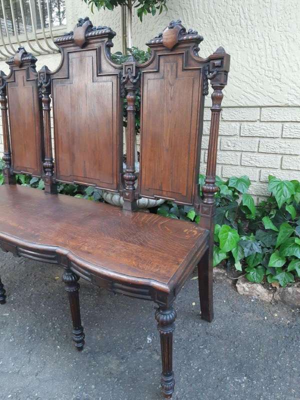 French 19th Century oak carved 3-seater bench, 129cm high, 135cm wide