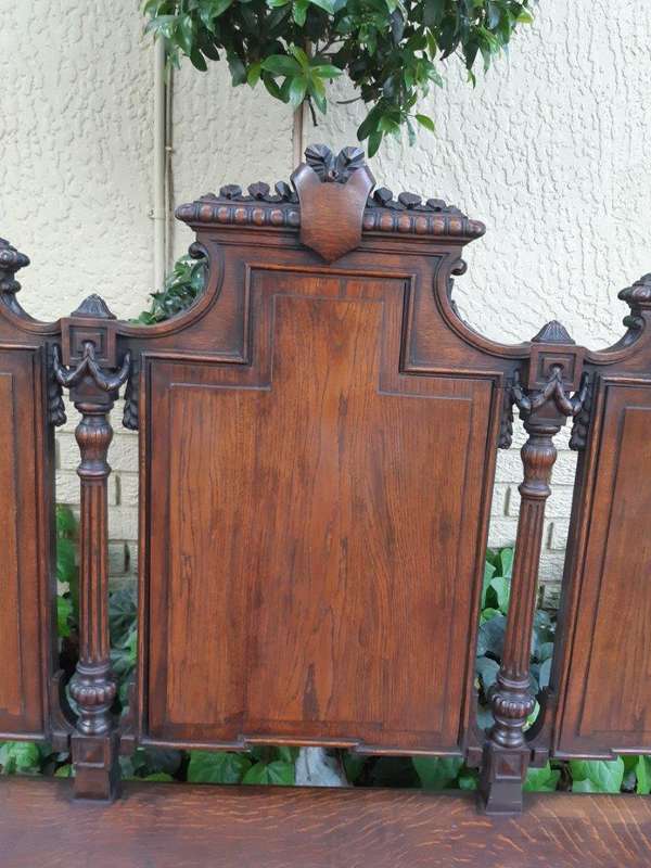 French 19th Century oak carved 3-seater bench, 129cm high, 135cm wide