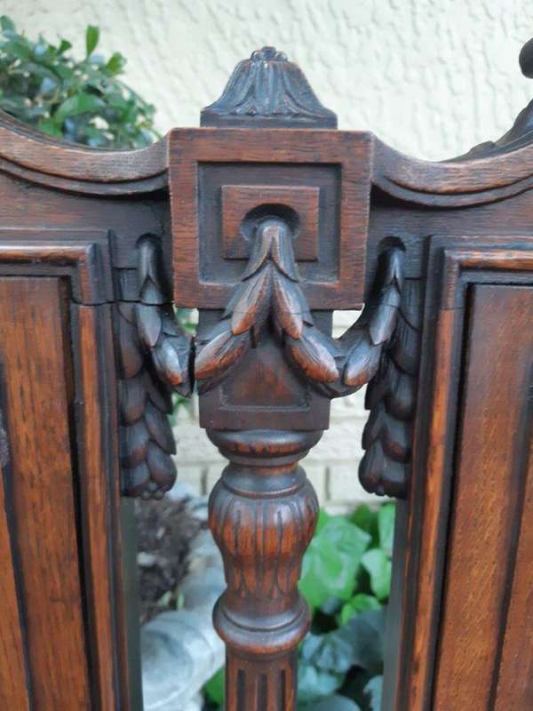French 19th Century oak carved 3-seater bench, 129cm high, 135cm wide